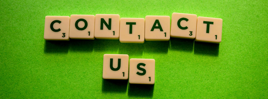 Contract us written in Scrabble letters Contract us written in Scrabble letters